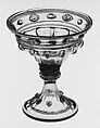Footed vessel (saltcellar?), probably Antonio Salviati (Italian, 1816–1890), Topaz-tinted nonlead glass. Blown, pattern molded, applied and impressed parts, gilt.
