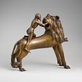 Aquamanile in the Form of Samson and
the Lion, Bronze; quaternary copper alloy (approx. 78% copper, approx. 10% zinc, approx. 6% tin, approx. 5% lead) with natural patina. Remnants of the iron armature are in the lion’s legs and the figure of Samson., Northern European (?), possibly German