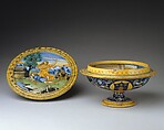 Broth bowl and cover (scodella and tagliere) from an accouchement set; Aeneas leaving Troy with his father and son (inside bowl); Pyramis and Thisbe (on cover), Baldassare Manara (Italian, Faenza, active first half 16th century), Maiolica (tin-glazed earthenware)
