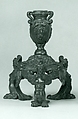Candlestick supported by three female demi-figures (pair with .1379), Copper alloy with a reddish to brown patina and remnants of a black lacquer patina., Italian, Venice