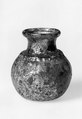 Jar, Apparently almost colorless glass with a brown or yellowish tint. Blown, the body inflated in a dip mold, the rim finished at the furnace., Roman