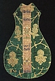 Chasuble Front with an Orphrey Band, Silk and gilt-metal-strip-wrapped silk plain weave, brocaded with gilt metal thread.<br/>Binding tape: cotton plain weave<br/>Lining: linen plain weave, glazed<br/>Front Orphrey band: silk, linen, and gilt-animal-substrate-wrapped linen, Italian, Spanish or Turkish, German