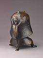 Aquamanile in the Form of a Human Head, Bronze; Ternary copper alloy with a very high percentage of zinc (approx. 68% copper,
approx. 26% zinc, approx. 4% tin), covered with a thin black lacquer patina; traces of cinnabar have been detected on the interior and exterior of the vessel., German or French, Paris (in fourteenth-century Hildesheim style)
