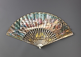 Folding fan, Leaf: gouache and bronze paint on paper.
Sticks and guards: mother-of-pearl, carved, pierced and veneered, decorated with gold-and-silver-toned metal leaf.
Pivot: green paste jewel., Austrian or German