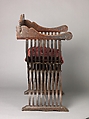 Folding armchair (sedia a Savonarola type), Walnut, partly turned and carved; red plain velvet., Italian