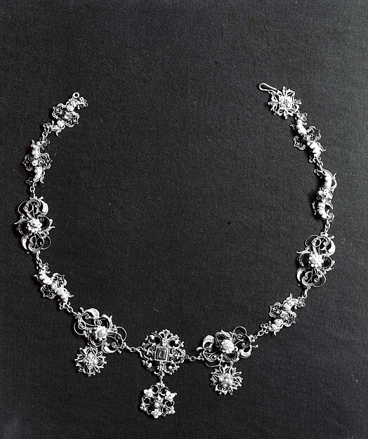Necklace Formed of Fifteen Dress Ornaments